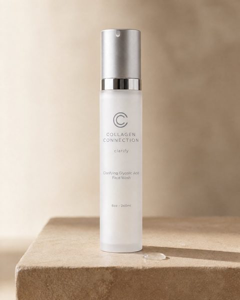 Clarifying Glycolic Acid Face Wash, frosted pump bottle on stone