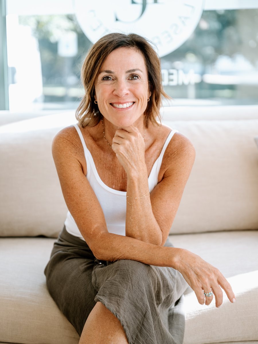 The owner of North Shore Laser Center on the sofa in the lounge